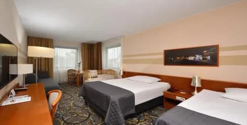 Co to jest suita w hotelu? Odkryj jej zalety i różnice z pokojem